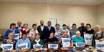 Алексей Логинов посетил собрание ветеранского актива Среднеахтубинского района 